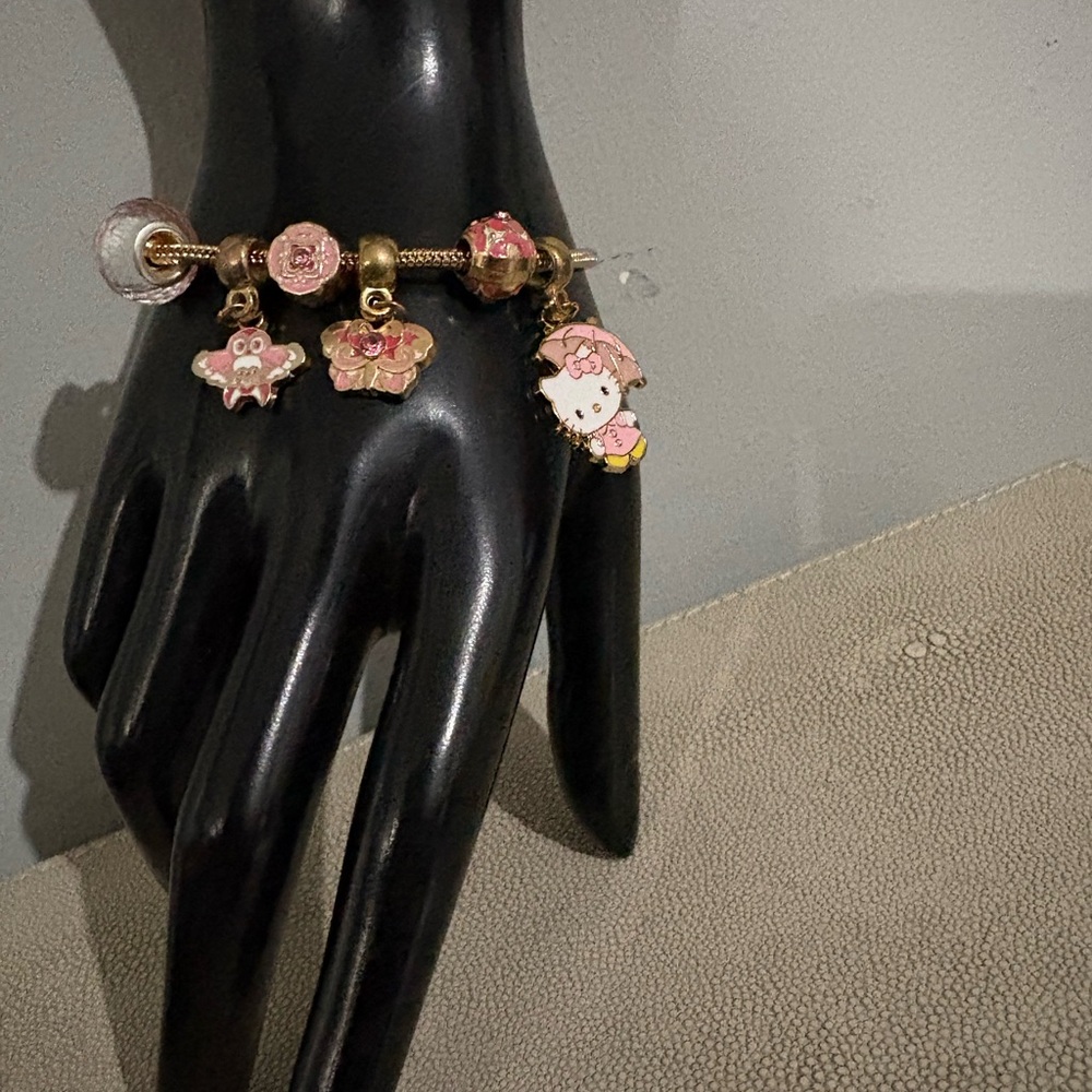Gold and Pink Charm Bracelet